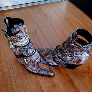 Jeffrey Campbell Caceres snake skin bootie has never been worn.
